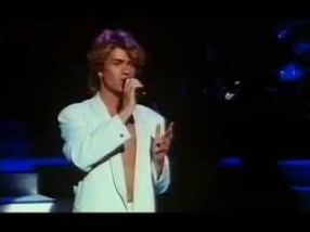 White suit with no shirt. Even better.